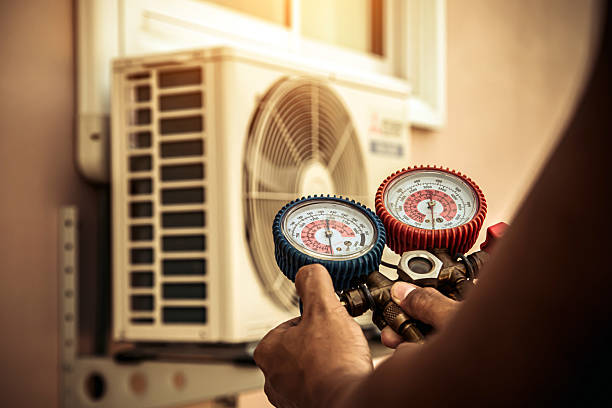 Professional Hvac technician working in Hogansville, GA